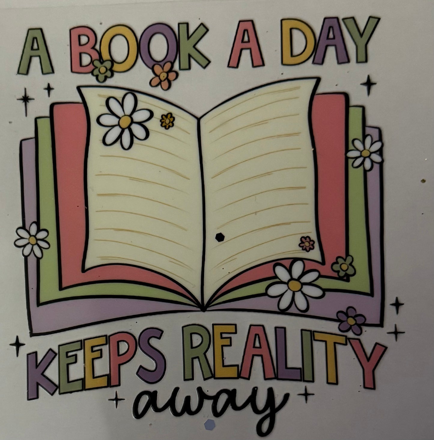 A book a day keeps reality away